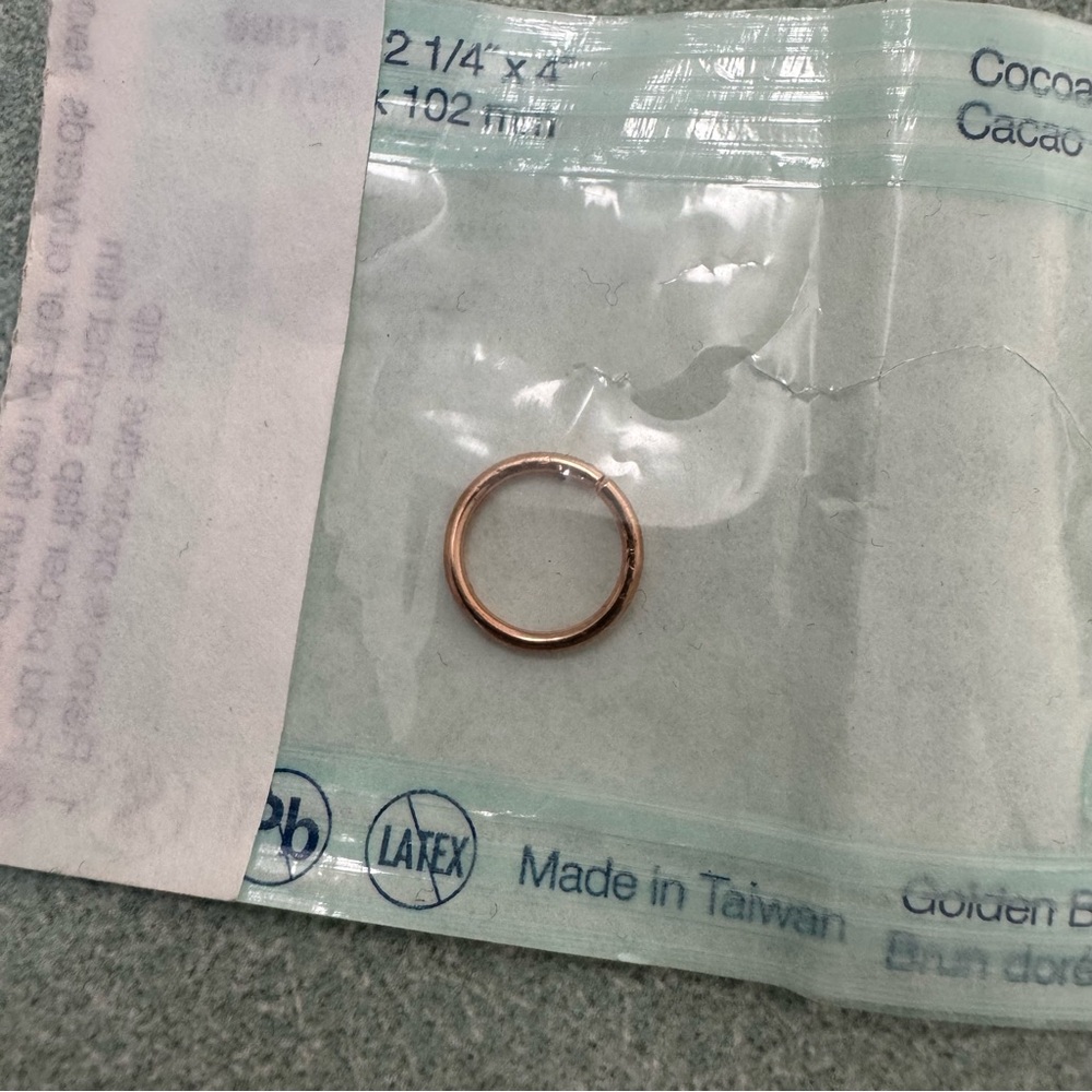 Solid rose gold lip ring, or piercing